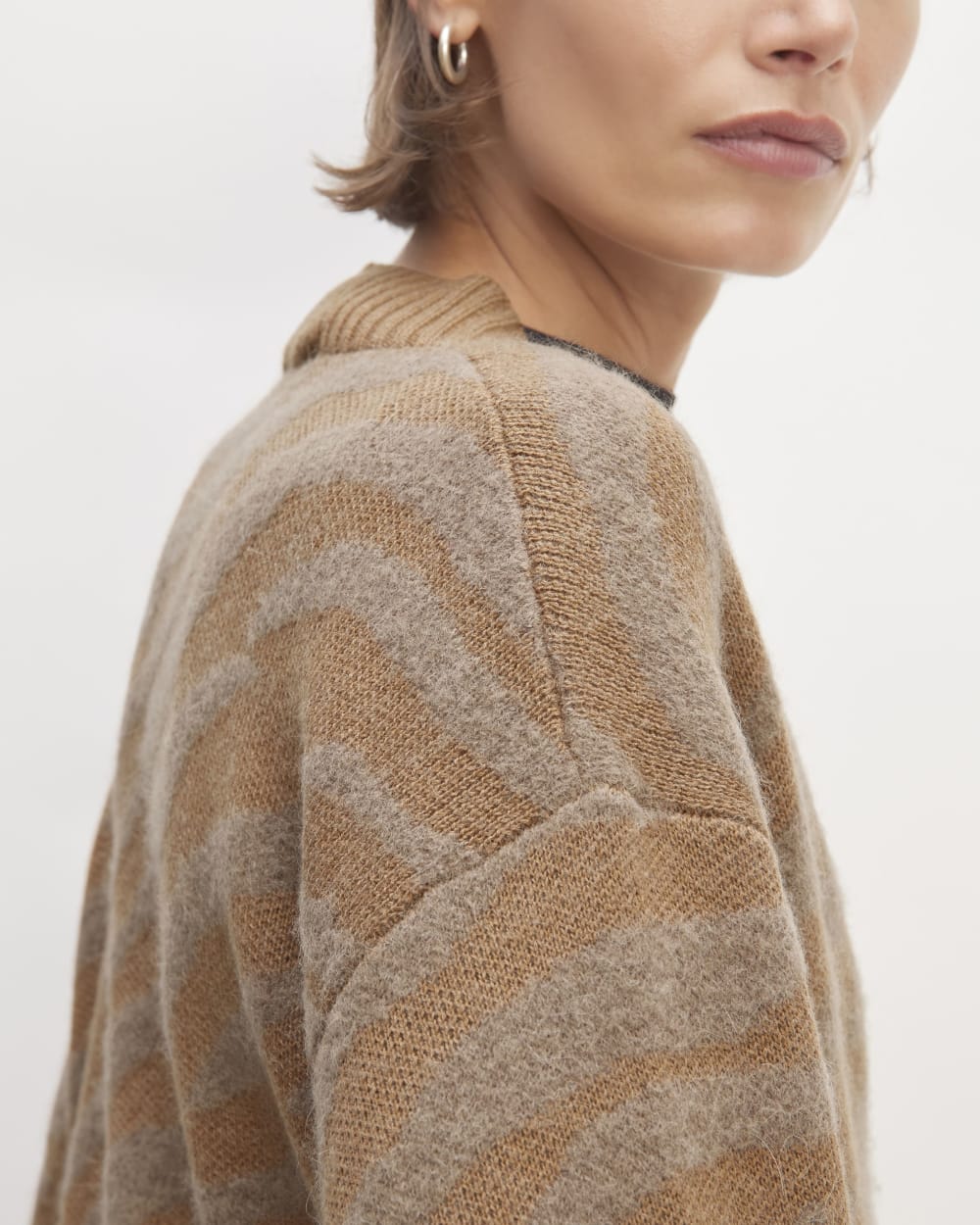 The Alpaca Tiger Jacquard Cardigan in Camel / Medium Brown — detail view